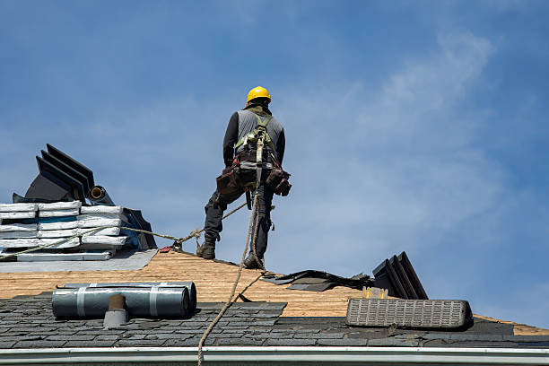 Professional Roofing technician working in Arock, OR